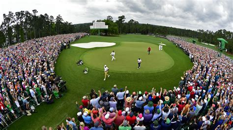 Masters champion Tiger Woods celebrates winning the Masters at Augusta National Golf Club ...