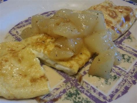 Quail egg omelette with goat cheese and pears poached in wine and brandy. Just about everything ...