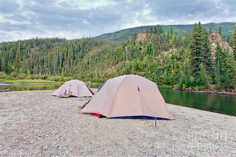 Tents at river in remote Yukon taiga wilderness Photograph by Stephan ...