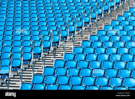 rows of blue seats in a stadium Stock Photo - Alamy