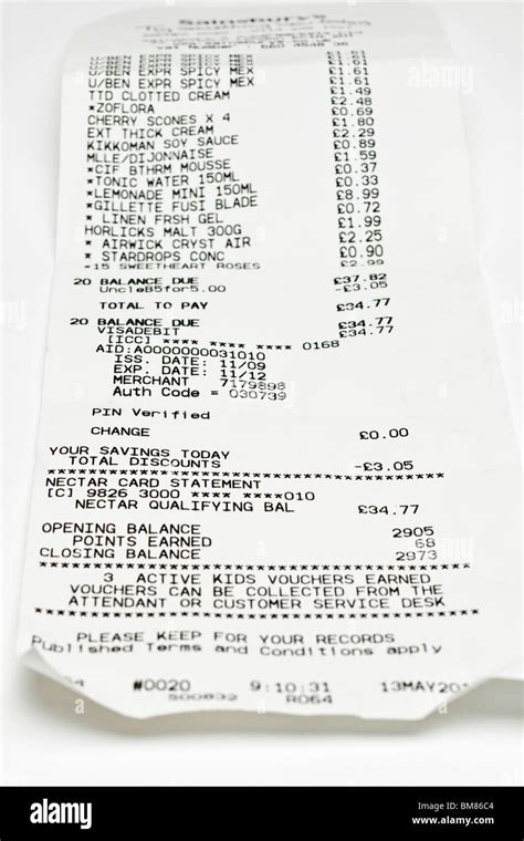 single supermarket till receipt Stock Photo - Alamy