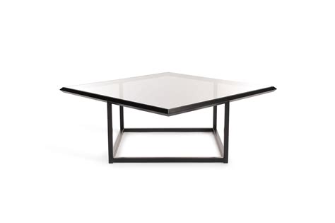 a glass and metal coffee table on a white background with the top turned upside down