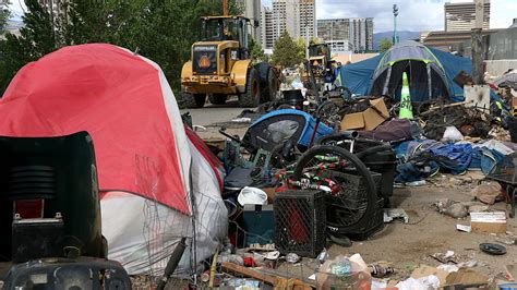 Watch: City of Reno cleans up homeless encampment along Truckee River