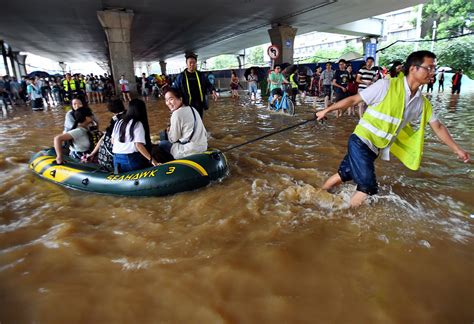 China: Photos of flooded cities after record amounts of rain