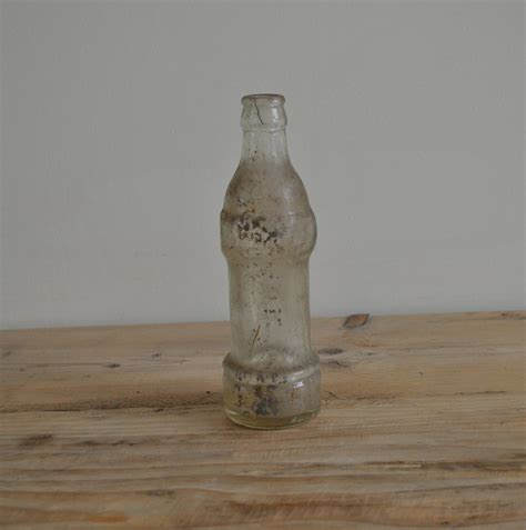 Vintage clear glass bottle Tizer