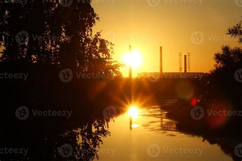 The sunset view on a river, a forest and colorful sky. 13954066 Stock ...