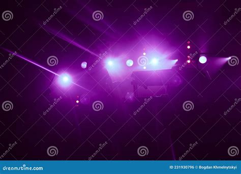 Purple Concert Lights on Bright Stage Lights with Up Laser Rays on the ...