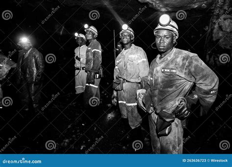 Workers in Mining Equipment at the Underground Platinum Mine in ...