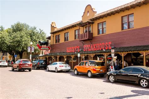 Street View with Restaurants at the Fort Worth Stockyards, a Historic District that is Located ...