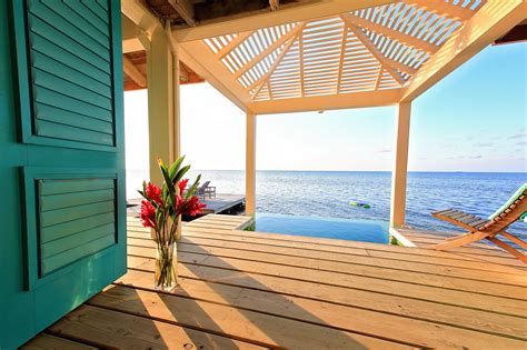 The 11 Most Incredible Overwater Bungalows in the World | Overwater bungalows, Luxury belize ...