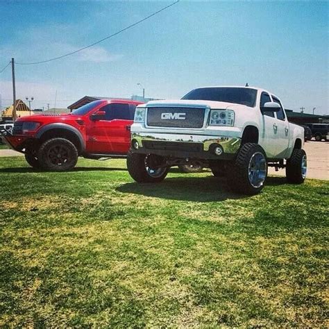 white lifted GMC Sierra truck with oversize tires | See more about ...