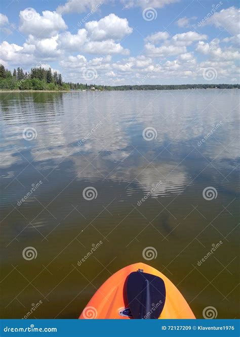 Paddle board on water stock image. Image of shoreline - 72127209