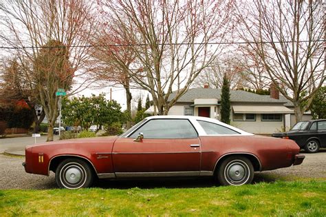 OLD PARKED CARS.: 1973 Chevrolet Laguna.