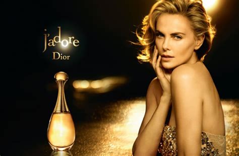 Charlize Theron Glitters Like Gold in Dior J’adore Fragrance Ad