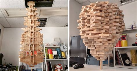 Guy Breaks His Own World Record for Balancing 1,512 Jenga on One