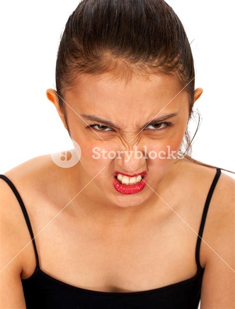 Angry Asian Girl Pulling A Face Royalty-Free Stock Image - Storyblocks