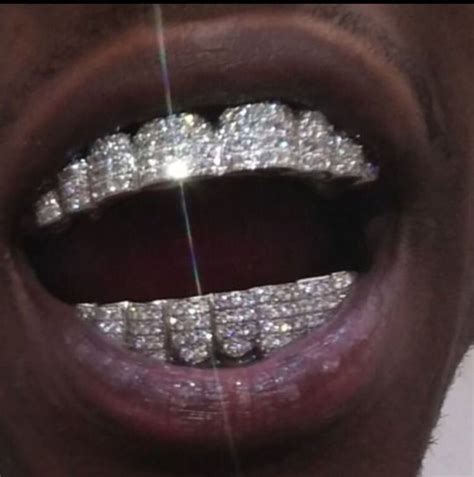 Pin by 🇯🇲Original Haffigaza 🇯🇲 on quavo huncho | Diamond grillz, Teeth jewelry, Grillz