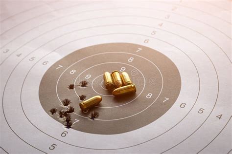 Bullets on Paper Target for Shooting Practice Stock Photo - Image of ...