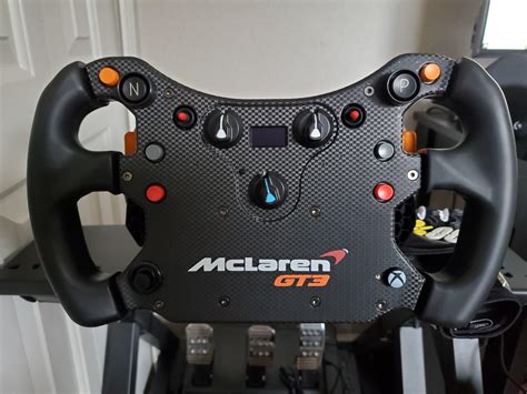 After a 1 week delivery delay, my McLaren GT3 V2 wheel is here! I agree ...