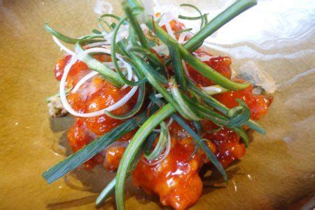 Red deep fried chicken dish, served with okra and a sweet chilli sauce. Bibigo - a Korean ...