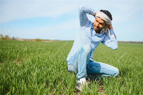 Premium Photo | Indian farmer in his wheat field