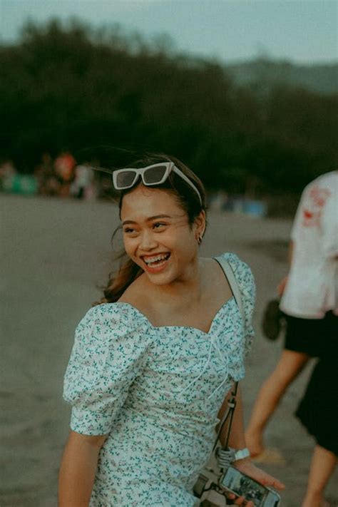 Cheerful Laughing Woman at Beach · Free Stock Photo