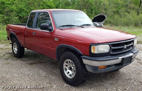 1997 Mazda B4000 Cab Plus pickup truck in Buckner, MO | Item EN9911 sold | Purple Wave