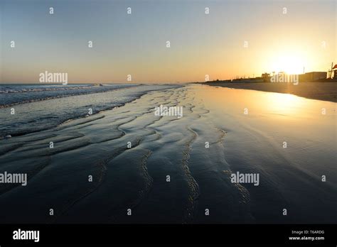 Sunrise over the Barka beach in Oman Stock Photo - Alamy