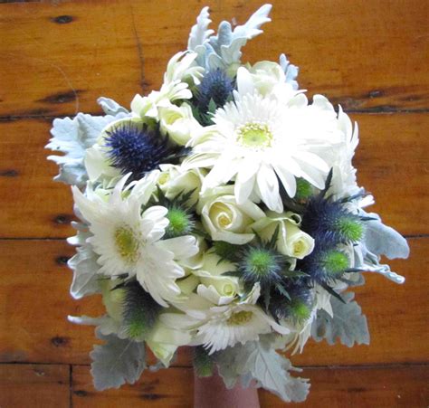 The brief for this bouquet was 'Nautical'. So we tucked some ocean inspiration with Sea Holly ...