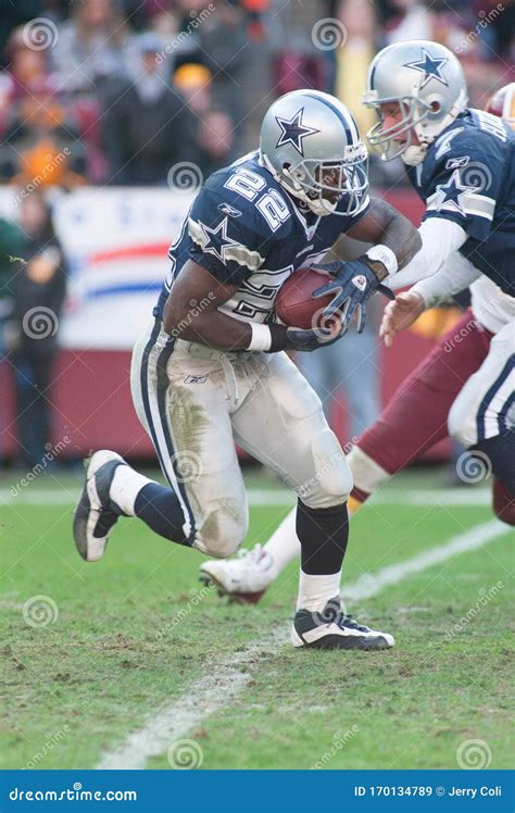 Emmitt Smith Takes a Hand-off from Chad Hutchinson Editorial Stock Image - Image of field ...