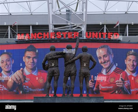 Trinity Statue of George Best, Bobby Charlton, and Denis Law outside of ...