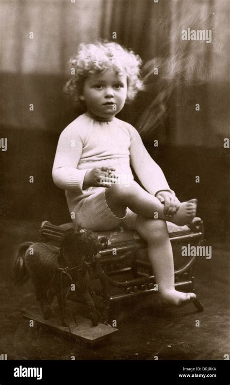 Portrait of a small girl smoking a cigarette Stock Photo - Alamy