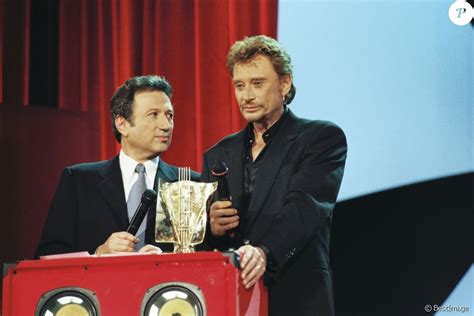 Michel Drucker et Johnny Hallyday à l'Olympia pour les Victoires de la ...