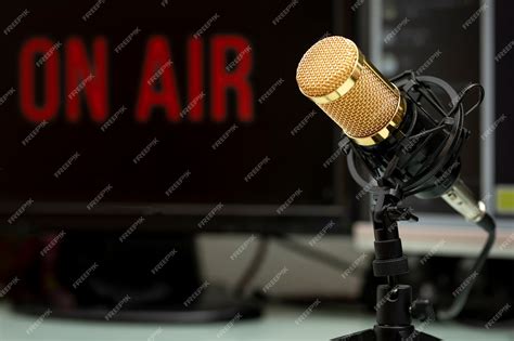 Premium Photo | Professional microphone on work table for podcast ...