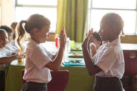 Premium Photo | Girls playing clapping game