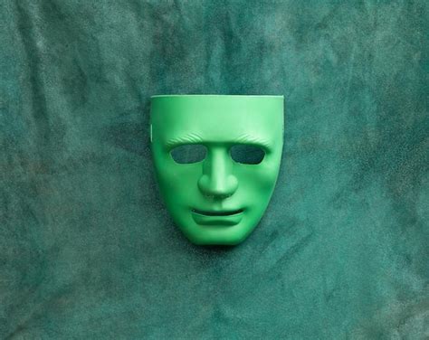 Premium Photo | Abstract green mask on green background