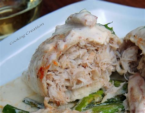 Cooking Creation: Baked Crab-Stuffed Flounder with Champagne Cream Sauce over Asparagus