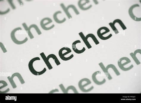 word Chechen language printed on white paper macro Stock Photo - Alamy