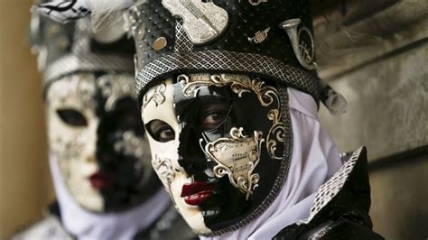 Venice carnival revellers don elaborate masks and costumes | CBC News