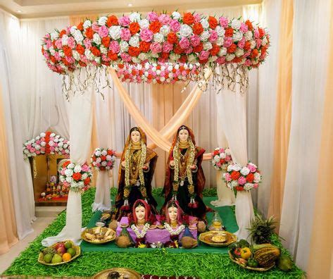 Gauri Ganpati decoration theme- wedding in lawn with handmade Rose flowers | Ganpati decoration ...