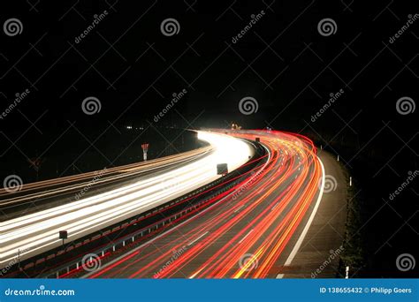 Highway traffic at night stock photo. Image of busy - 138655432