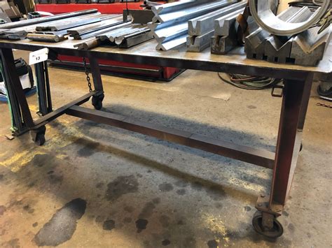 STEEL WORK TABLE ON WHEELS - Able Auctions