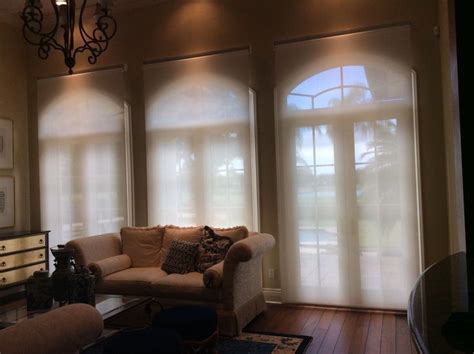 Motorized shades on arched windows. | Cheap curtains, Motorized shades, Arched windows