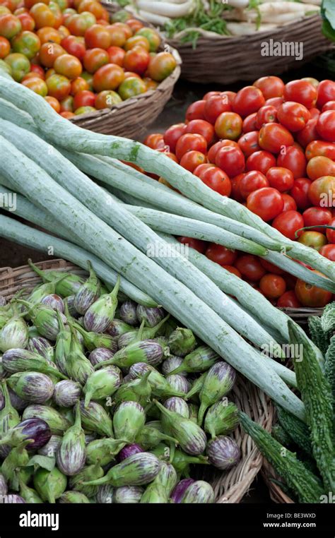 Indian vegetable market with vegetables in baskets Stock Photo - Alamy