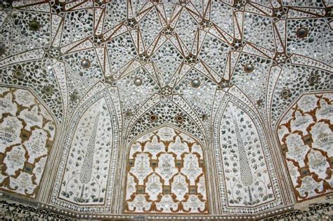 an intricately decorated ceiling in the middle of a building