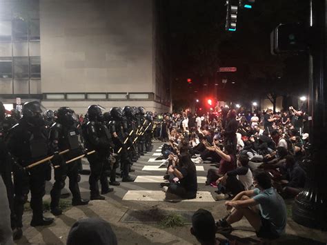 Peaceful protest demonstration, 10:23pm. Don’t know her name, but one of the clergy leaders ...