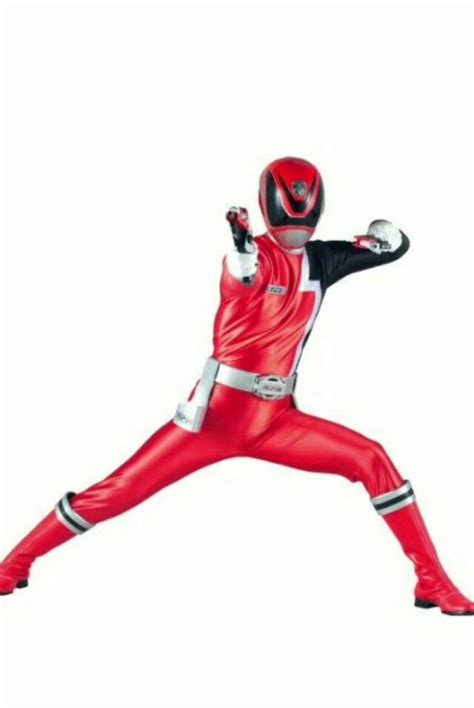 a man in a red and black suit is doing a kick