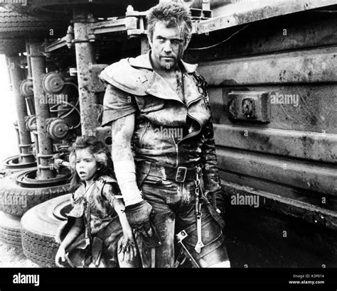 MAD MAX 2 [AUS 1981] aka MAD MAX: THE ROAD WARRIOR EMIL MINTY, MEL GIBSON Date: 1981 Stock Photo ...