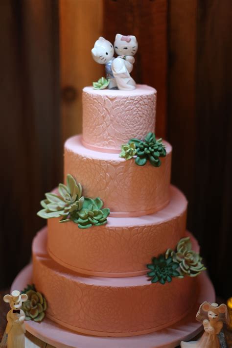 Hello Kitty Topped Wedding Cake