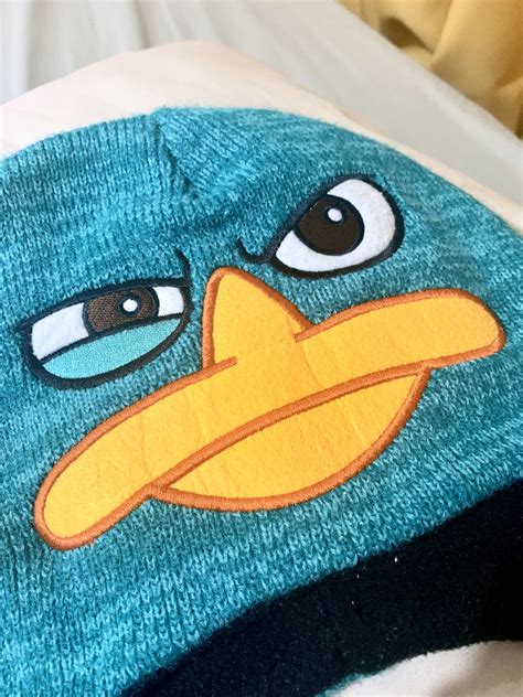 Phineas & Ferb’s Perry the Platypus Beanie, Women's Fashion, Watches ...